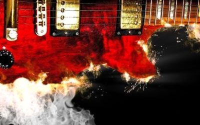 music concept with burn in fire and smoke design red electric guitar isolated on black background in dark